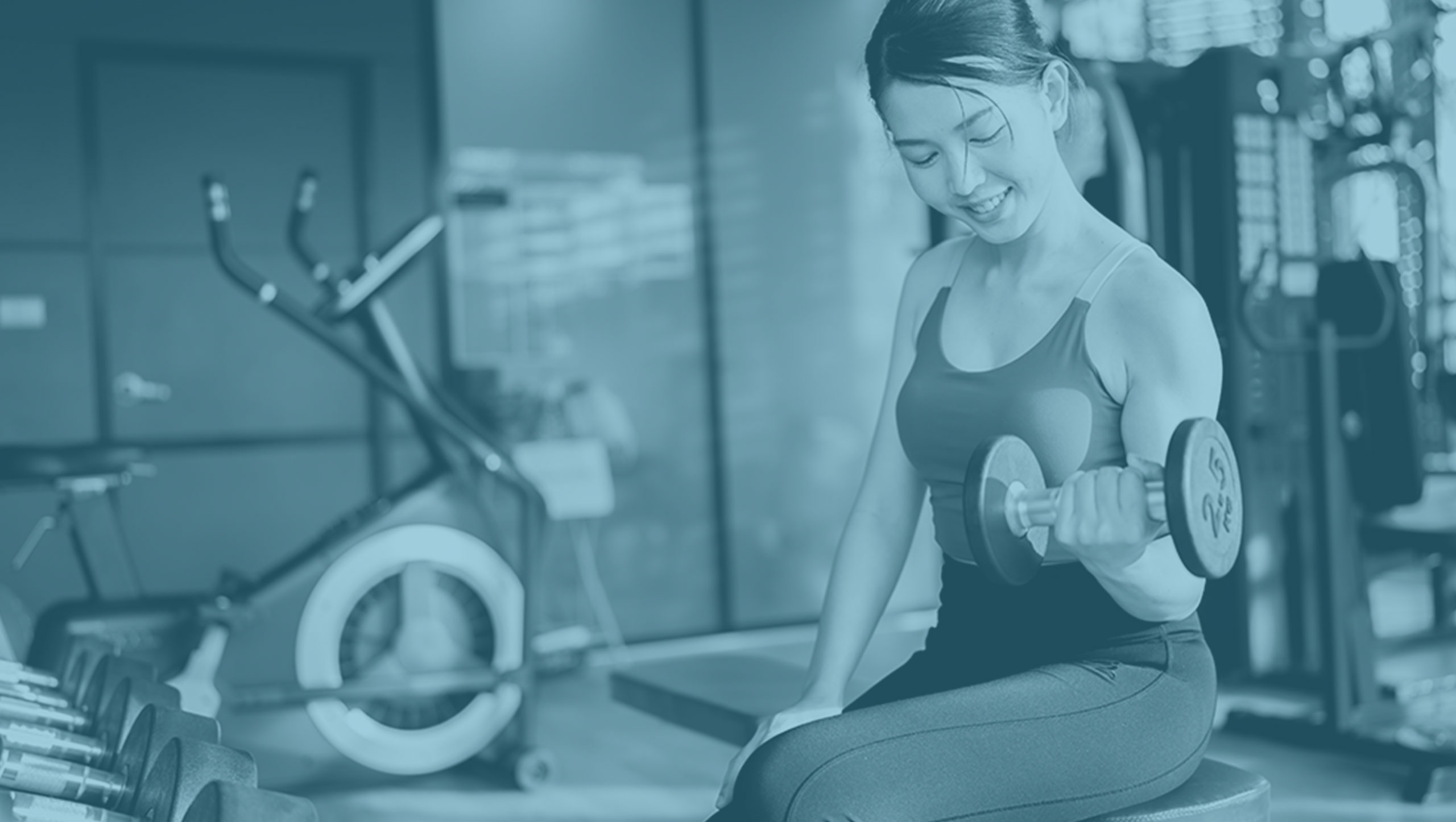 Woman in gym exercising 